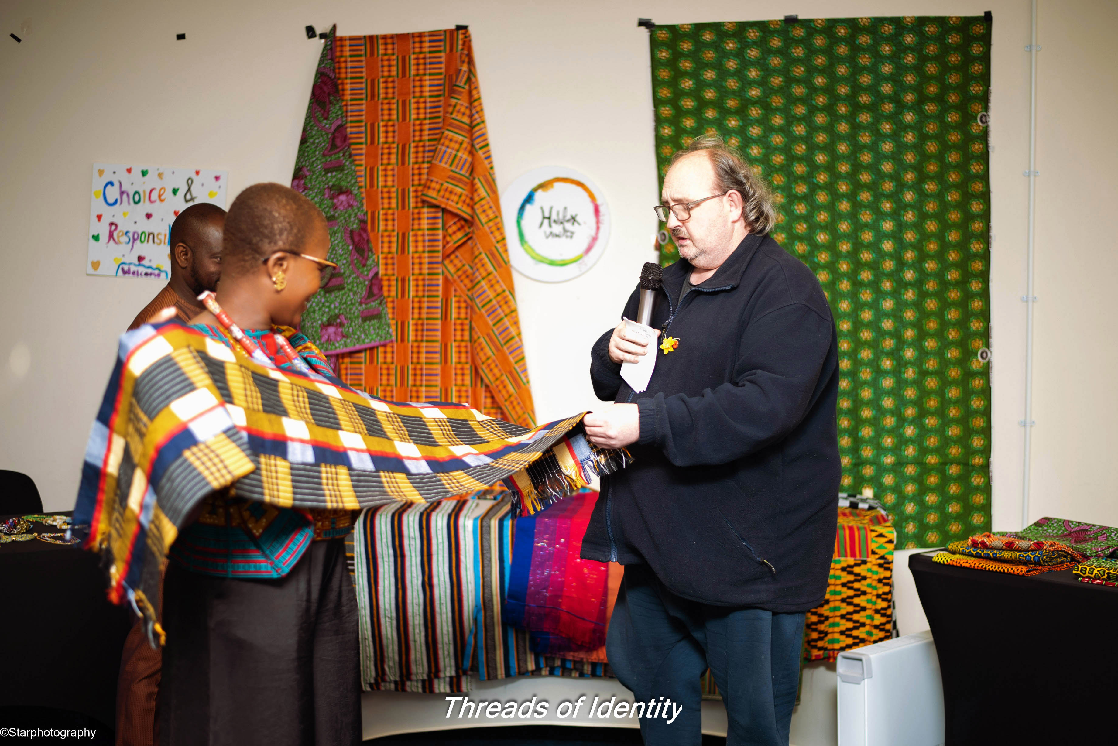 Participant wearing African-inspired fashion during Threads of Identity
